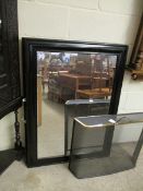 THREE LARGE BLACK PAINTED RECTANGULAR FRAMED WALL MIRRORS