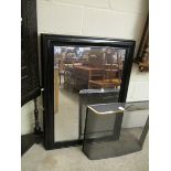 THREE LARGE BLACK PAINTED RECTANGULAR FRAMED WALL MIRRORS