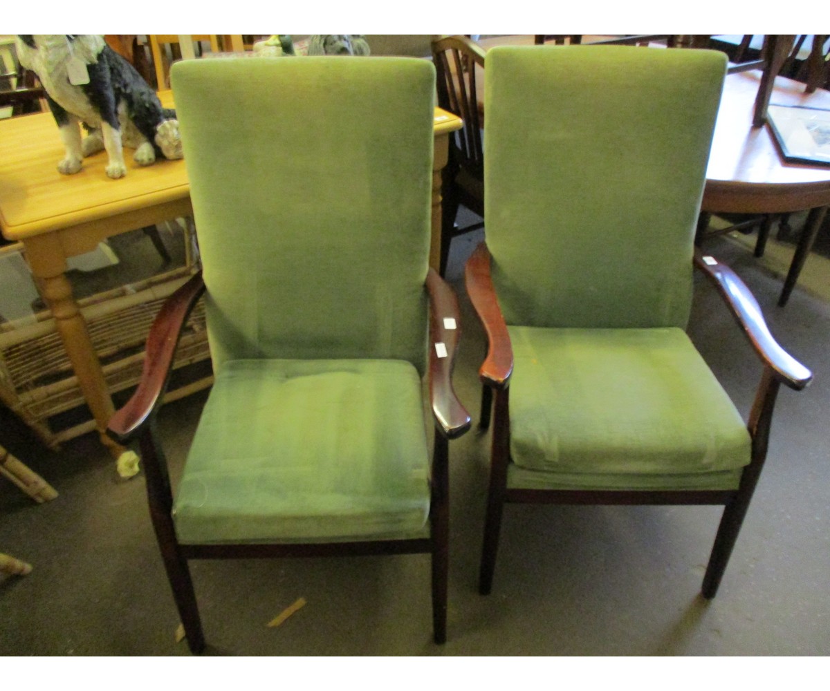 PAIR OF TEAK FRAMED GREEN UPHOLSTERED FIRESIDE CHAIRS