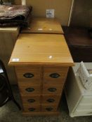 PAIR OF PINE FRAMED FOUR-DRAWER PILLAR TYPE CHESTS WITH CUP HANDLES