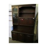 TEAK FRAMED SMALL LIVING ROOM DISPLAY CABINET WITH DROP FRONT WITH OPEN SHELF AND GLAZED DOOR, THE