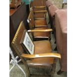 SET OF FOUR OAK FRAMED LEATHER UPHOLSTERED DINING CHAIRS COMPRISING TWO ARMCHAIRS AND TWO DINING