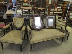 EDWARDIAN MAHOGANY AND INLAID PART SALON SUITE COMPRISING A FLORAL UPHOLSTERED TWO-SEATER SOFA AND