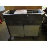 INDUSTRIAL TROLLEY WITH LIFT OUT TRAYS WITH TWO DRAWERS OVER TWO CUPBOARD DOORS ON HEAVY