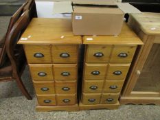 PAIR OF PINE FRAMED FOUR DRAWER PILLAR TYPE CHESTS WITH CUP HANDLES