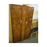 WALNUT FRAMED DOUBLE DOOR CUPBOARD WITH FLORAL TYPE CAST HANDLES