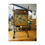 19TH CENTURY ROSEWOOD FIRE SCREEN WITH WOOL EMBROIDERED PANEL