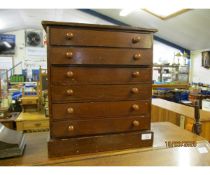 STAINED PINE SPECIMEN CABINET WITH SIX DRAWERS