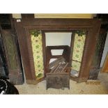 CAST IRON TILED FIRE SURROUND (SOME DAMAGE)