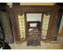 CAST IRON TILED FIRE SURROUND (SOME DAMAGE)