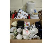 TWO BOXES OF VARIOUS MUGS, CUPS, LIGHT SHADES, TORCHES, BT PHONE ETC