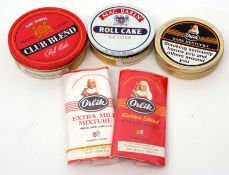 Various tobacco includes Mac Baren Club Blend, Mac Baren roll cake, Orlik Dark Kentucky in tins