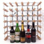 A 36 bottle wine rack containing 1 x Gaudin White Vermouth, 1 x Mulled wine, 1 x Don Pablo Sherry,