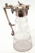 Late 19th/early 20th century silver plated mounted and glass claret jug, 29cm high