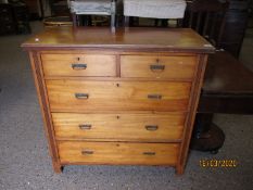 SATINWOOD TWO OVER THREE FULL WIDTH DRAWER CHEST WITH REEDED DETAIL AND BRASS SWING HANDLES