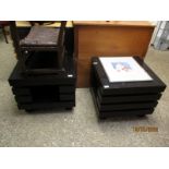 PAIR OF BLACK TUBE FORMED SEGMENTED SIDE TABLES OR COFFEE TABLES