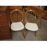 PAIR OF BEECHWOOD HARD SEATED STICK BACK KITCHEN CHAIRS