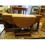 THREE SMALL OAK DROP LEAF TABLES WITH PLANKED ENDS