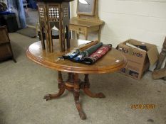 19TH CENTURY WALNUT OVAL CIRCULAR TILT TOP TABLE WITH INLAID DETAIL ON A QUATREFOIL BASE RAISED ON