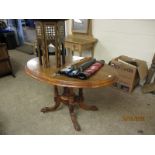 19TH CENTURY WALNUT OVAL CIRCULAR TILT TOP TABLE WITH INLAID DETAIL ON A QUATREFOIL BASE RAISED ON