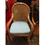 WICKER ARMCHAIR WITH TURQUOISE UPHOLSTERED CUSHION