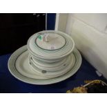 GROUP OF CLARICE CLIFF DINNER WARES DECORATED WITH A GREEN RINGED GEOMETRIC DESIGN COMPRISING TWO