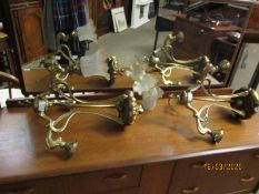 PAIR OF ARTS & CRAFTS BRASS THREE BRANCH CHANDELIERS