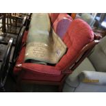TEAK FRAMED RED UPHOLSTERED AND BUTTON BACK ARMCHAIR
