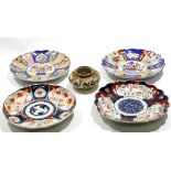 Group of Japanese Imari porcelain wares including four shaped dishes and a Satsuma ware bowl,