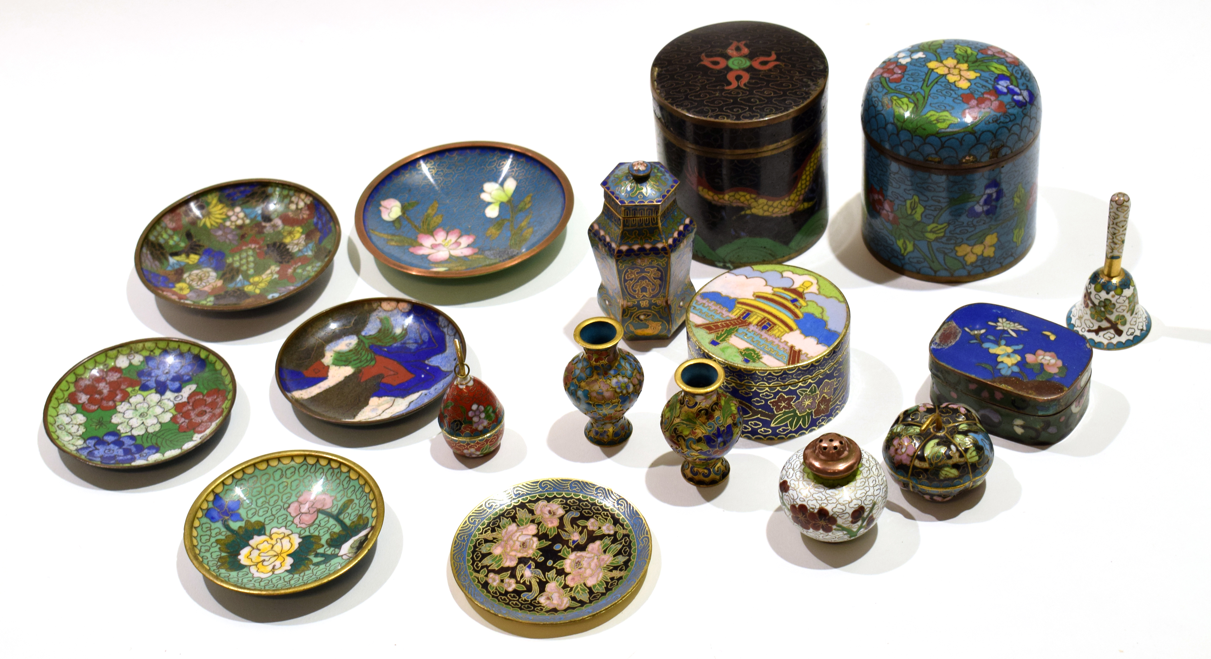 Group of cloisonne wares including two cylindrical jars and covers and other small miniature