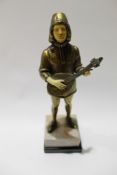 Gilt bronze and compositional bone figure of a standing minstrel with a mandolin wearing period