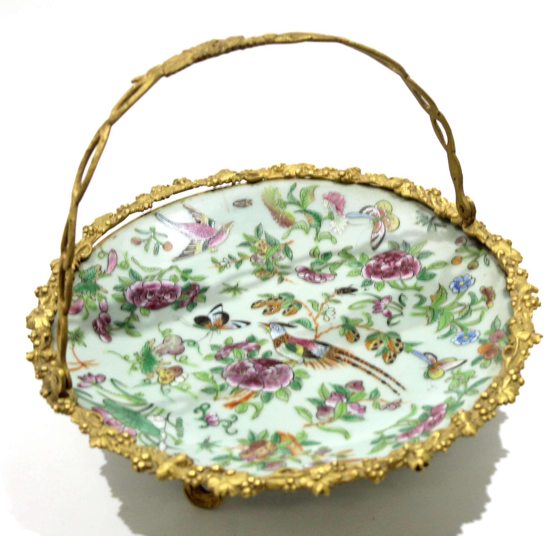 Late 19th century Canton plate with gilded metal mounts and handle, 27cm diam