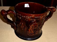 19th century Staffordshire treacle ground frog mug decorated in relief in typical style, the