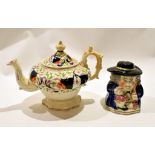 Gaudy Welsh Style Rockingham type tea pot together with a Staffordshire jar and cover modelled as