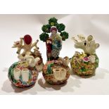 Group of five Staffordshire pen holders modelled as birds nests and a Staffordshire Walton type