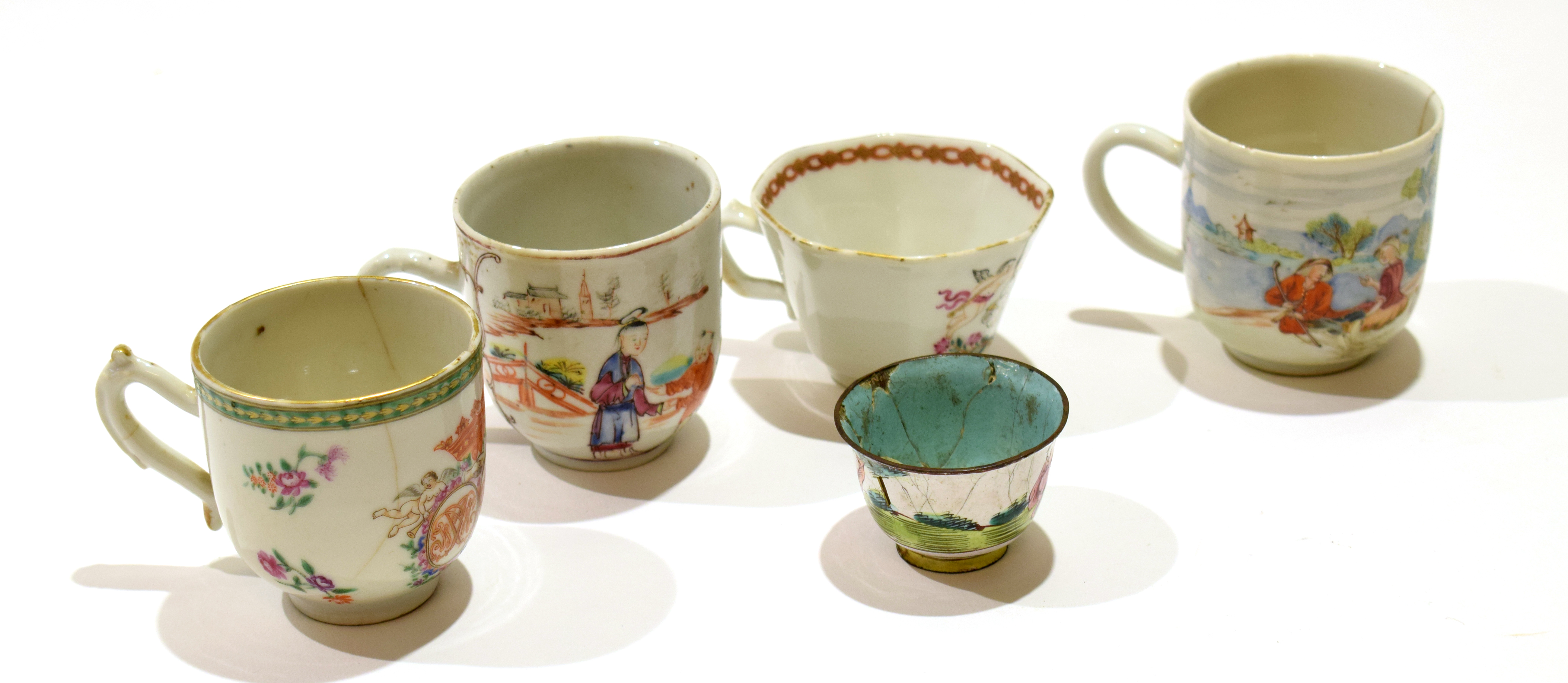 Group of 18th century Chinese porcelain cups including a marriage cup, decorated in polychrome