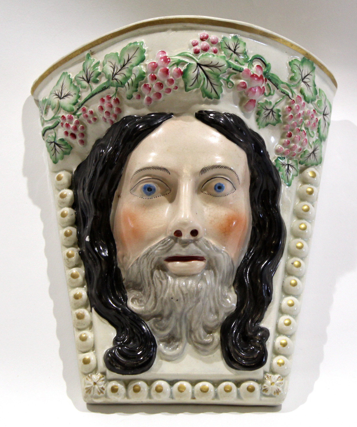 Unusual Staffordshire wall pocket modelled probably as Christ, with a garland of fruit, 24cm long - Image 5 of 5