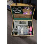 Ditmar vintage movie projector in a light oak case