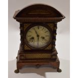 Late 19th century mahogany parcel gilded bracket clock with cast metal paw feet, 40cm high