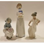 Large Lladro figure of a child with books together with a further Lladro figure of a girl sewing,
