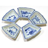 Group of five 18th century Chinese export pin trays, all with blue and white chinoiserie designs,