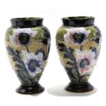 Pair of late 19th century Lambeth Doulton vases, the Slater's Patent ground decorated with tube