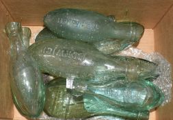 Box containing a collection of vintage glass lemonade and other bottles, some of local interest