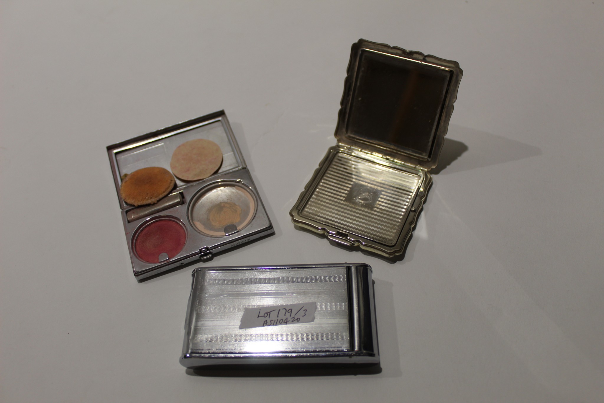 Three various vintage ladies compacts