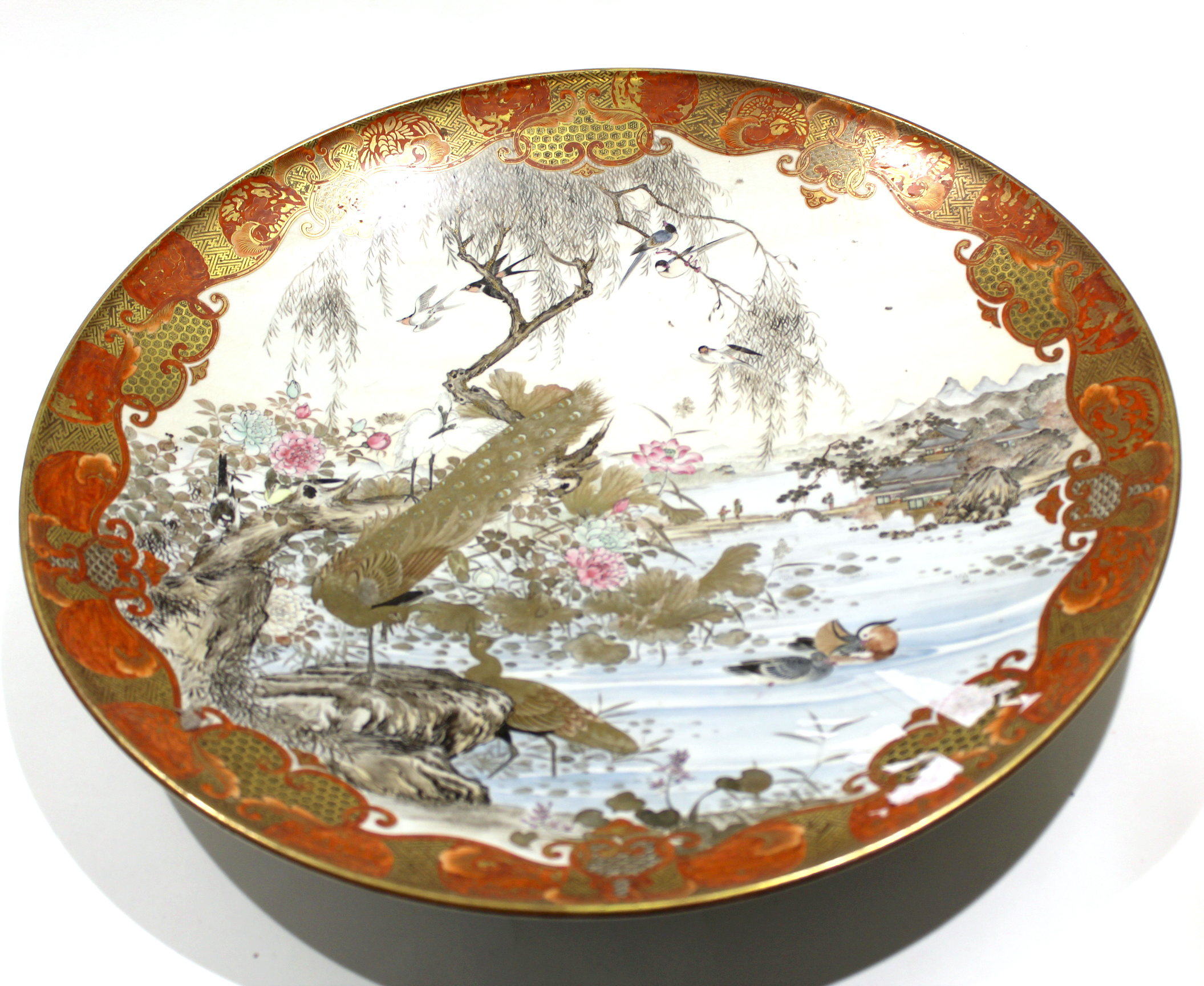 Large Satsuma dish, Meiji period, the centre decorated with a landscape scene and mountains with - Image 2 of 6