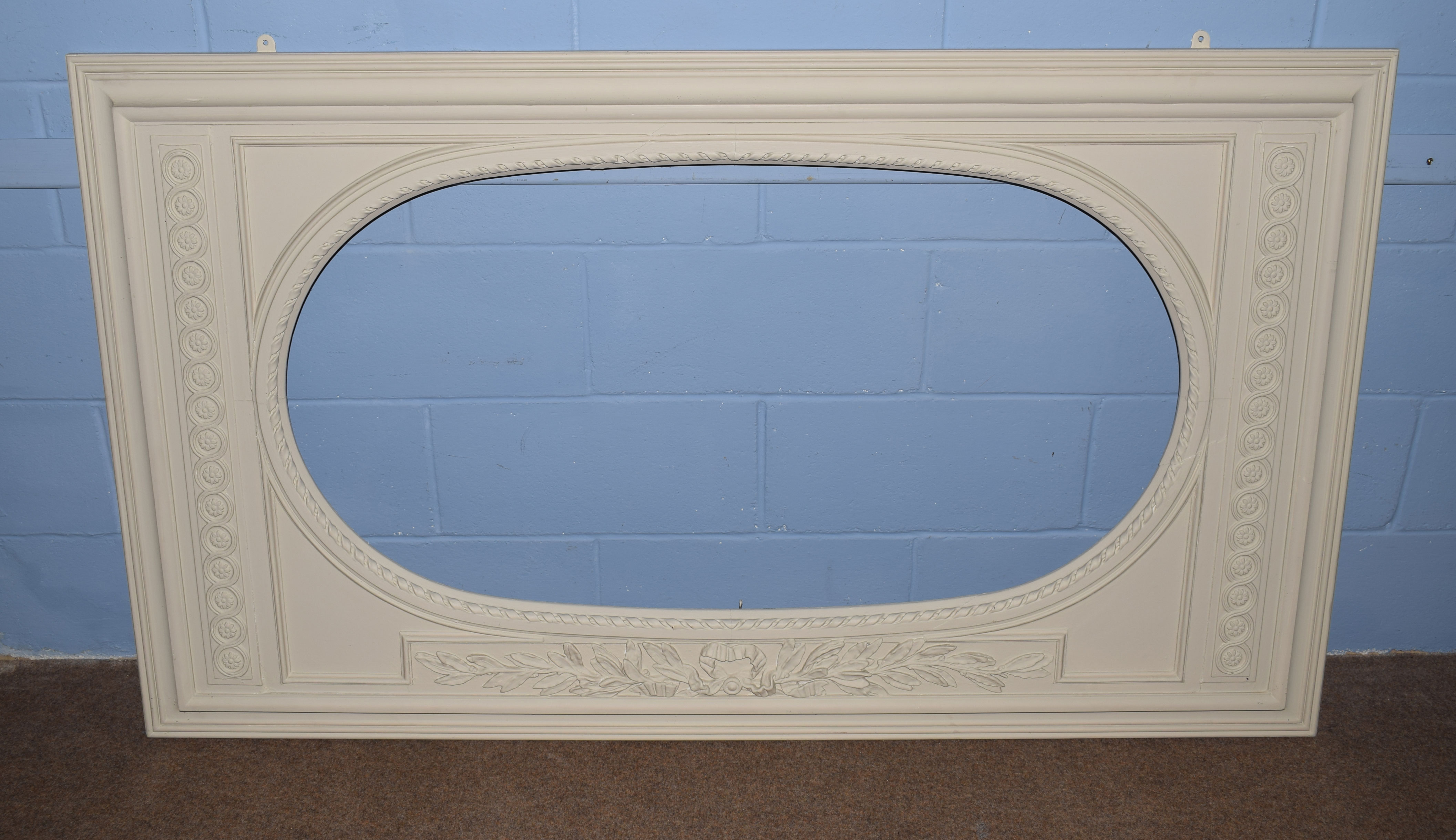 Early 20th century painted mirror frame, oval inset with flower and leaf decoration, oval inset 63 x