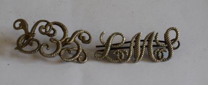 Two nickel rope script railway cap Badges in good condition: 1 x GER with two blade fittings, bent