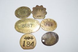 Collection of six LNER brass railway Paychecks: 1 x large oval ‘Running Dept. Gorton’, 3 x oval ‘