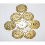 Collection of eight oval brass LNER ‘Norwich Loco’ railway Paychecks, various numbers.