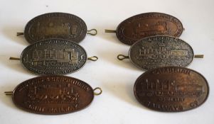 Six modern metal oval railway-interest collectors’ Badges with loops and split pins (1 pin